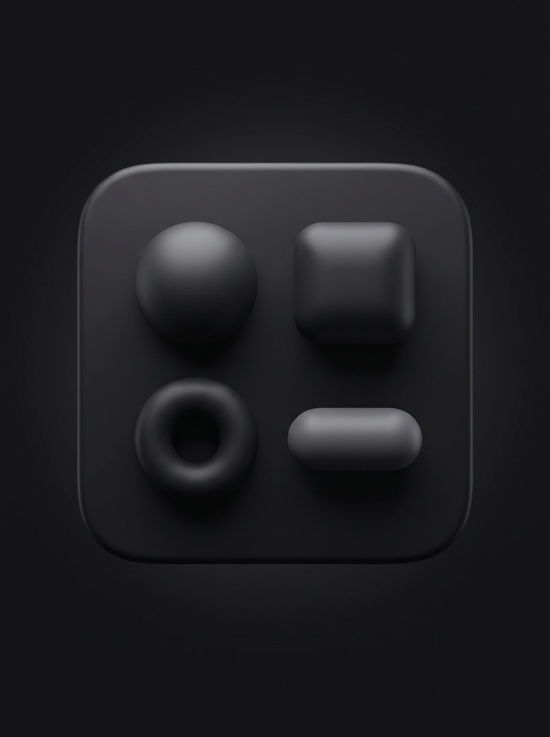A black tile with a sphere, a rounded square, a ring and a pill in a grid.